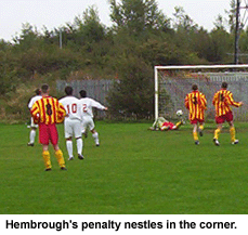 The 'keeper nearly gets Hembrough's penalty, but it was struck cleanly and accurately while the rest of the team restrained Emu