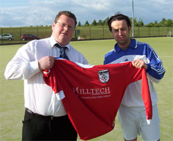 Watson and Gourlay with the new shirt, striking a pose for the sponsor, Milltech.