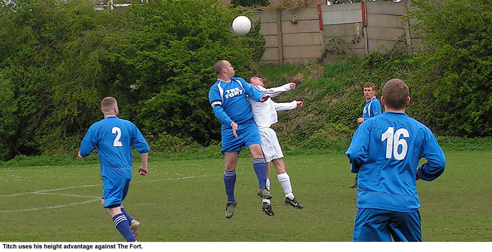 Titch goes for a high ball