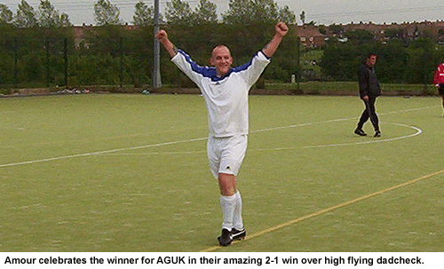 Oh L'Amour! Jason celebrates his stunning strike which put AGUK 2-0 up against dadcheck.com