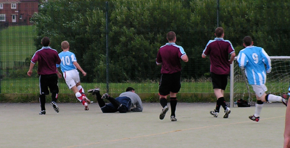 Tyzack scores the opener, with Logan sprawled on the floor...again.