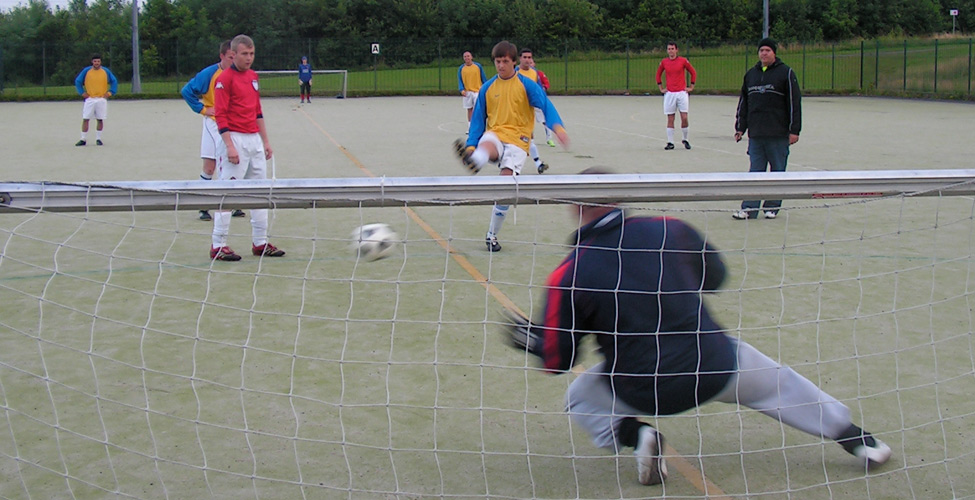 Charlie slots his unstoppable penalty in to give the Redhouse B team (also known as WWC) a great start.
