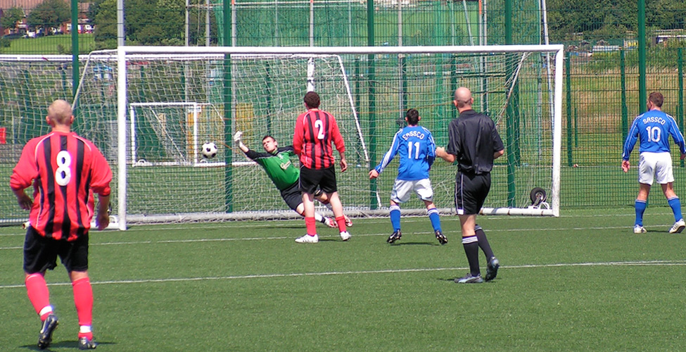 Dave Graham takes another shot in against the overworked Rutherford DFC 'keeper.