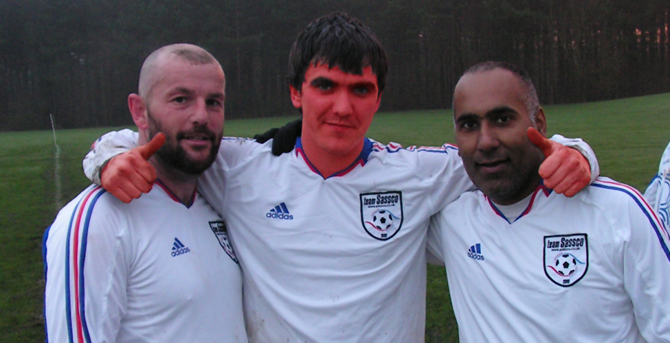 Simon (Osama) Mulvaney (First Aid), Wayne Greenwell (Team Coach, looking a bit off colour as he'd been blasted in his only testicle ten minutes before) and Davinder Sangha (General Manager).
