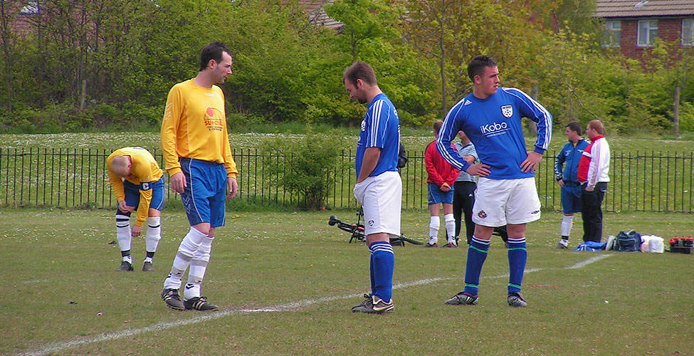 Neil Middlemiss and Scott Hembrough compare tackle sizes before the game while Callum Howe turns away.