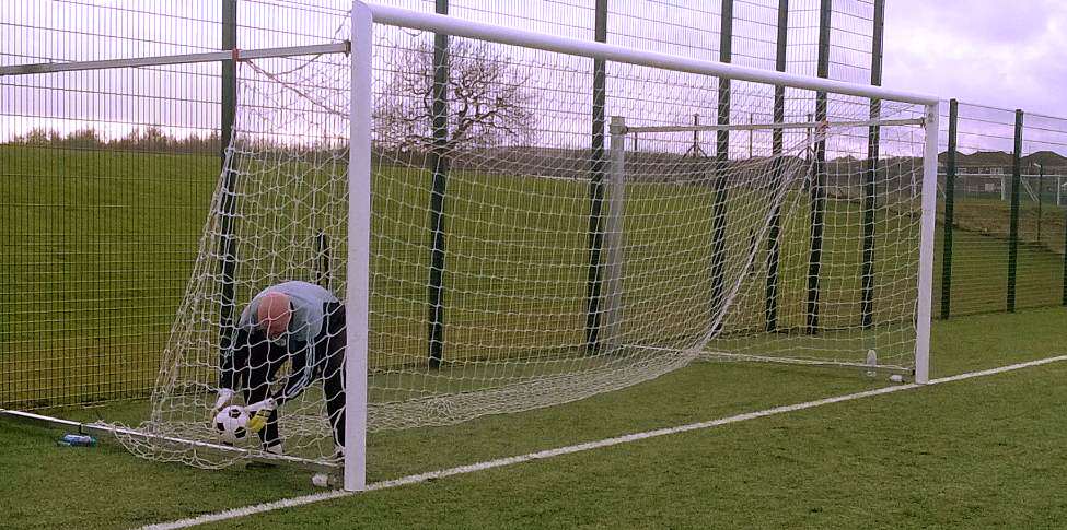 Muers, doing what he does best, picking up the ball out of the net, after being lobbed, again.